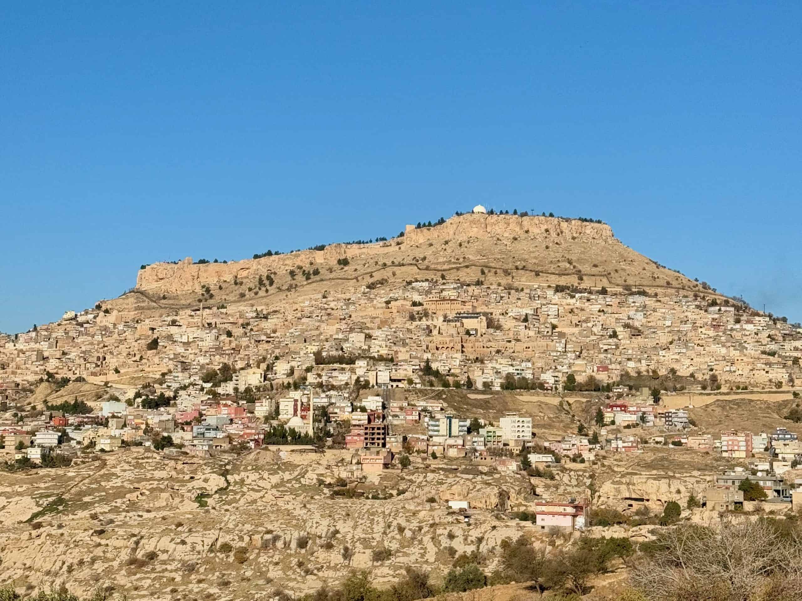 View of Mardin Old Town and Mardin Castle from scenic viewpoint.