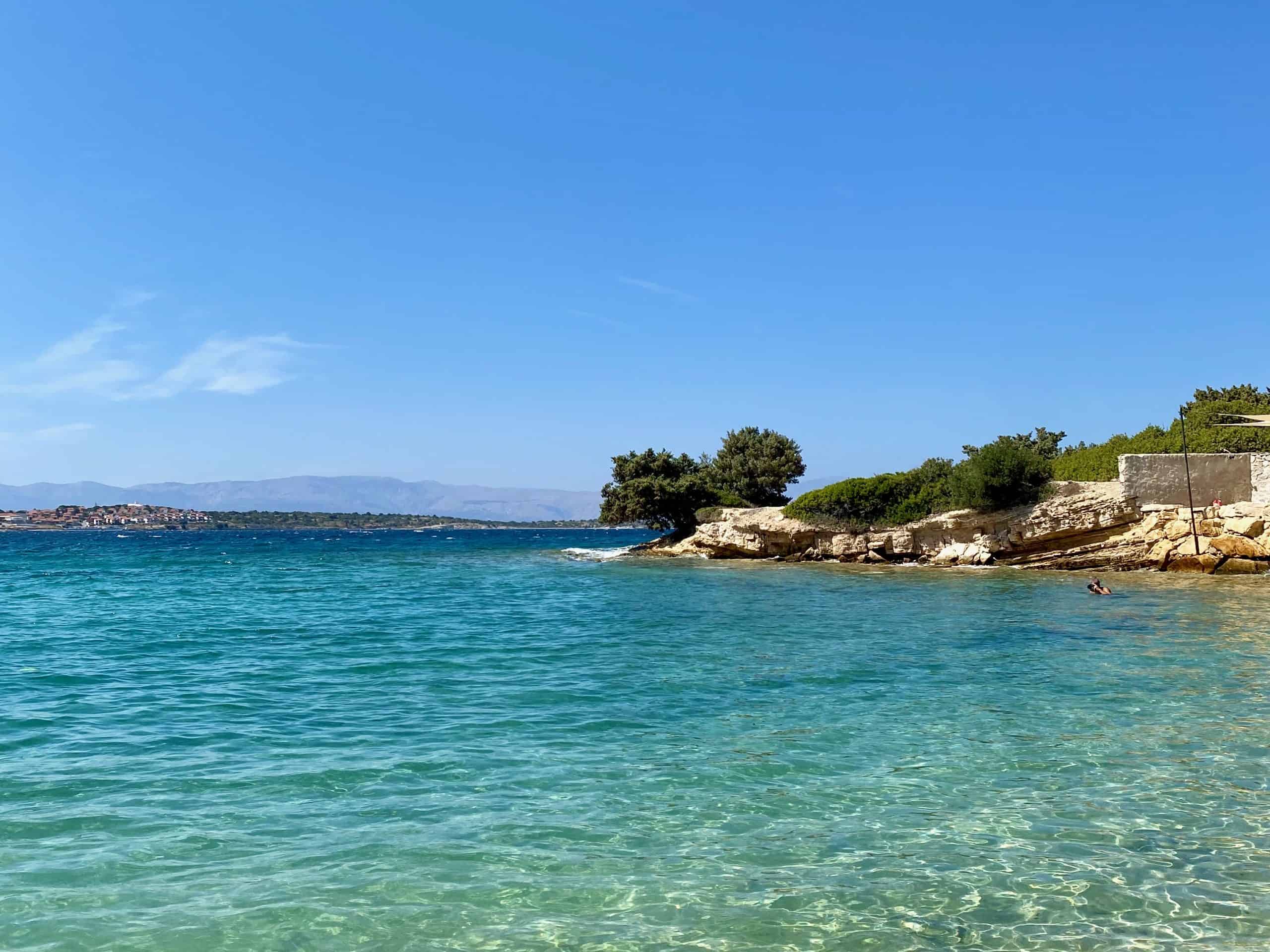 Crystalline beach water near Alacati old town turkey