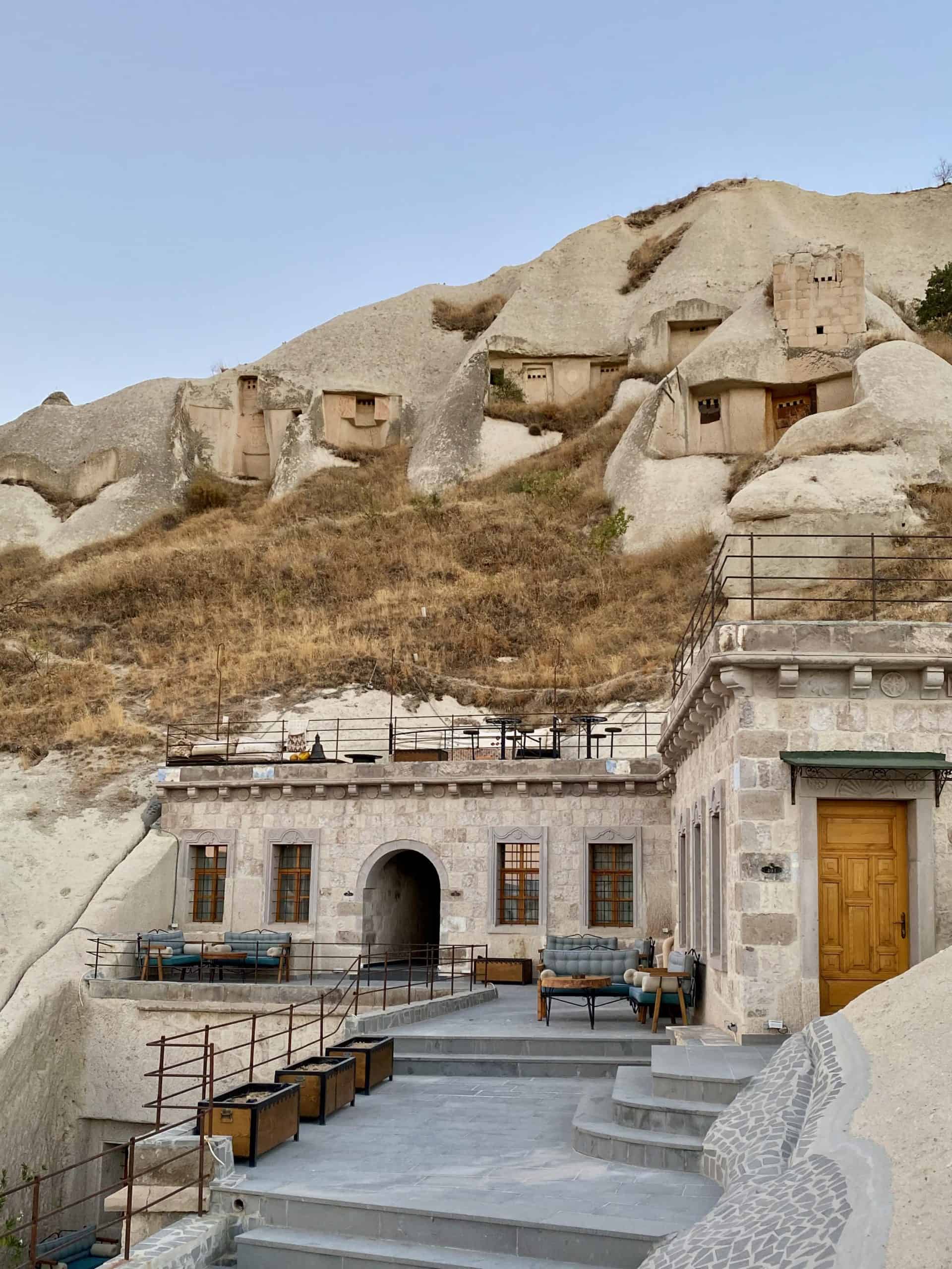 View of terrace and caves in a cave hotel in Goreme, Cappadocia.
